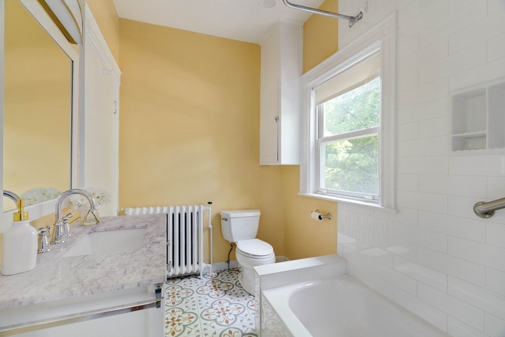 215 Clark Road Brookline, MA 02445 - Photo 31 of 41 a bathroom with a sink toilet and shower