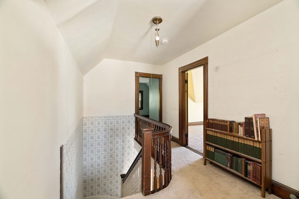 215 Clark Road Brookline, MA 02445 - Photo 33 of 41 a view of a hallway with workspace