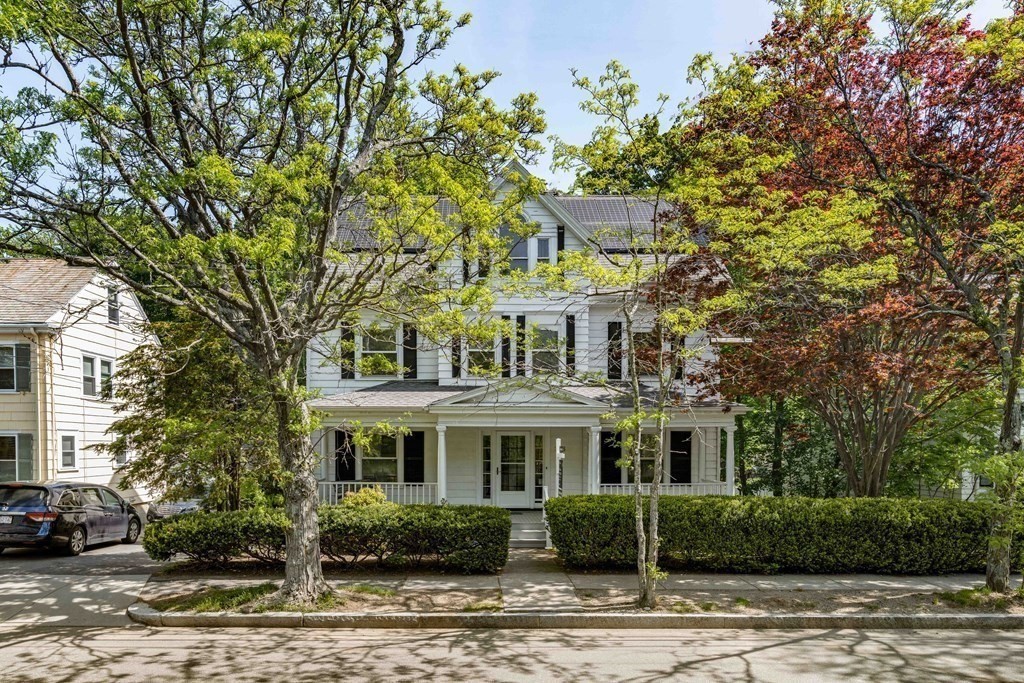 215 Clark Road Brookline, MA 02445 - Photo 37 of 41 a front view of a house with a garden