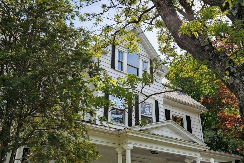 215 Clark Road Brookline, MA 02445 - Photo 40 of 41 a front view of a house with a tree