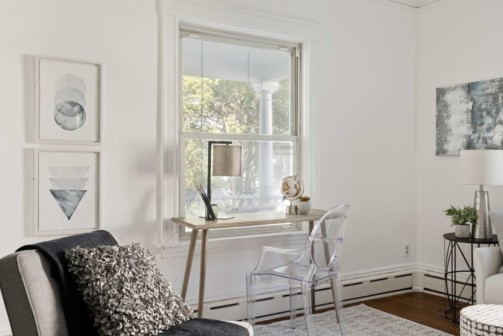 215 Clark Road Brookline, MA 02445 - Photo 5 of 41 a living room with furniture and a window
