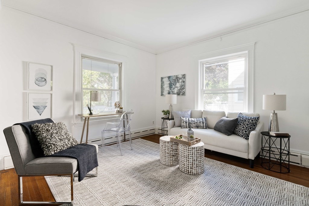 215 Clark Road Brookline, MA 02445 - Photo 7 of 41 a living room with furniture or couch and a window