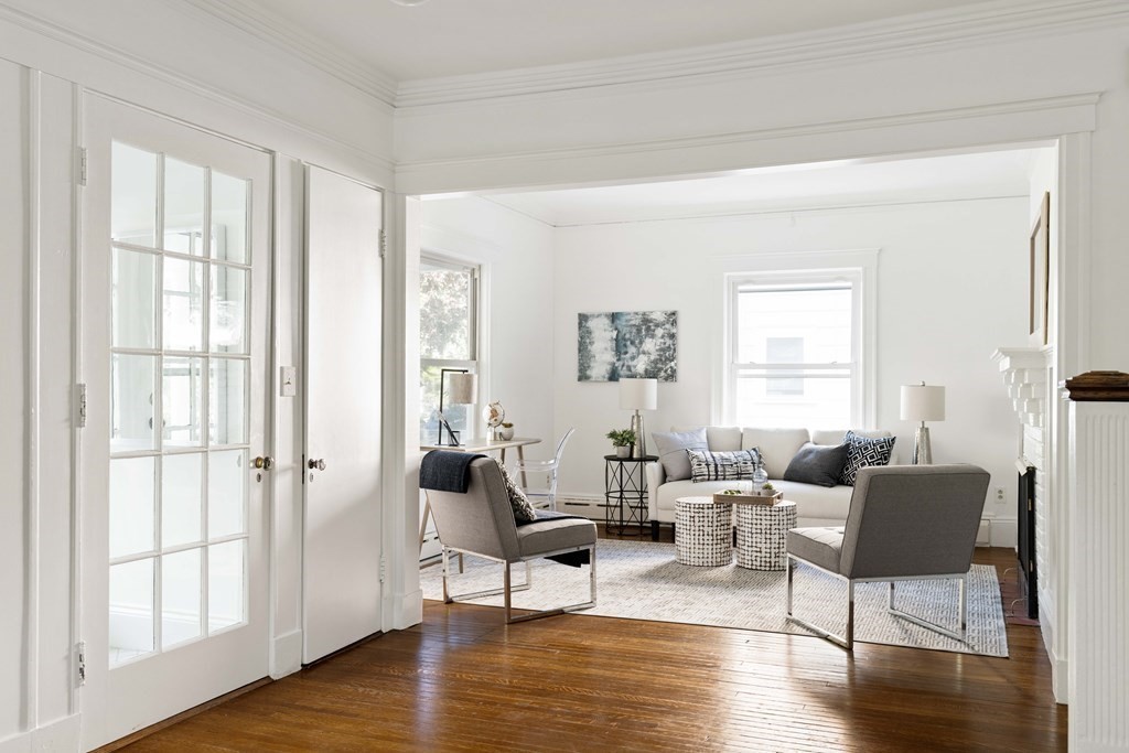 215 Clark Road Brookline, MA 02445 - Photo 8 of 41 a living room with furniture and a window