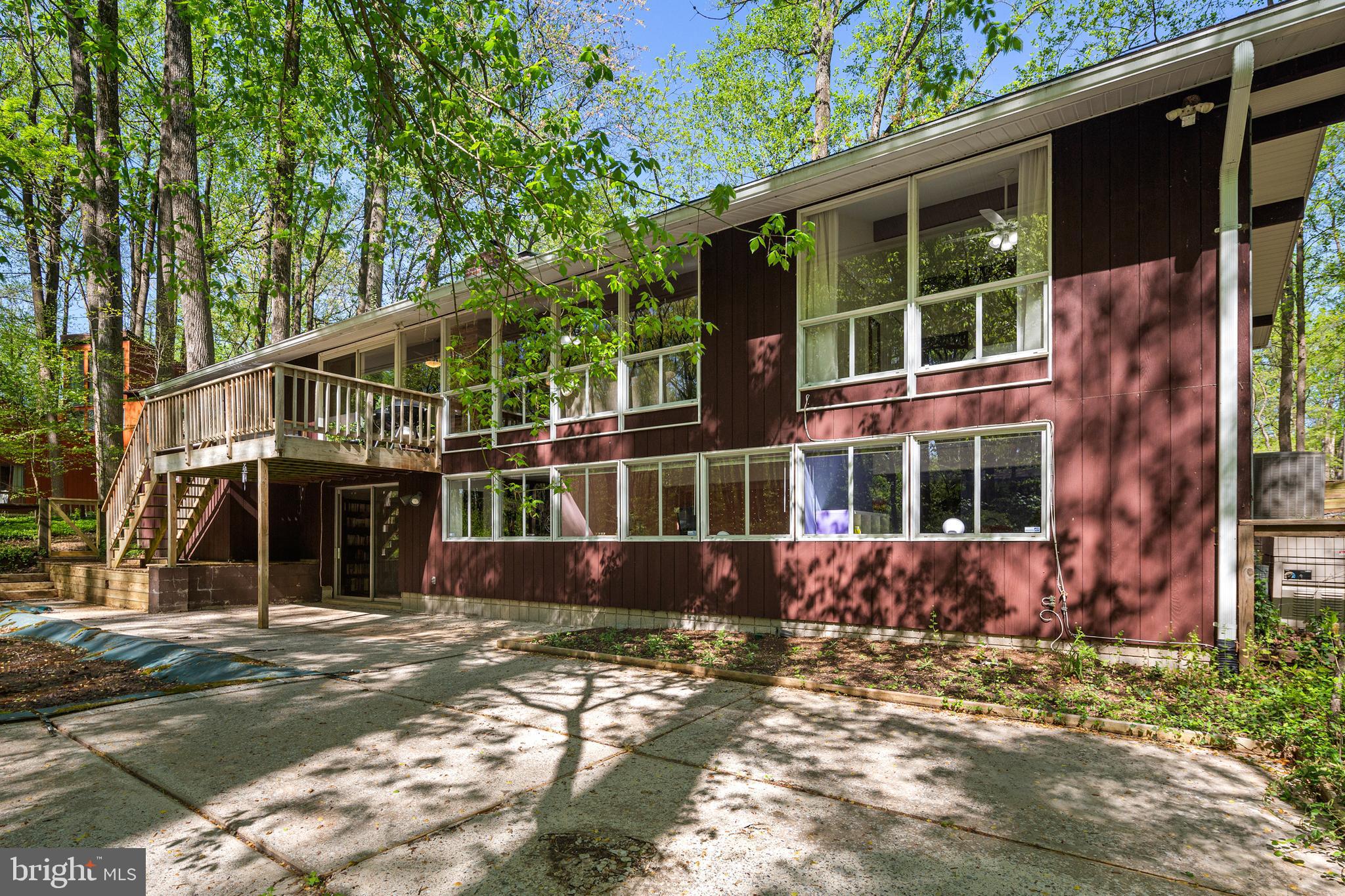 11097 Swansfield Road Columbia, MD 21044 - Photo 26 of 30 Windows on both floors bring the nature indoors