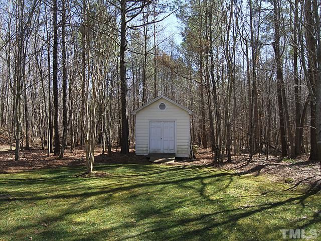 11800 Pembridge Lane Raleigh, NC 27613 - Photo 23 of 25 Shed in back yard with extra parking for boat.