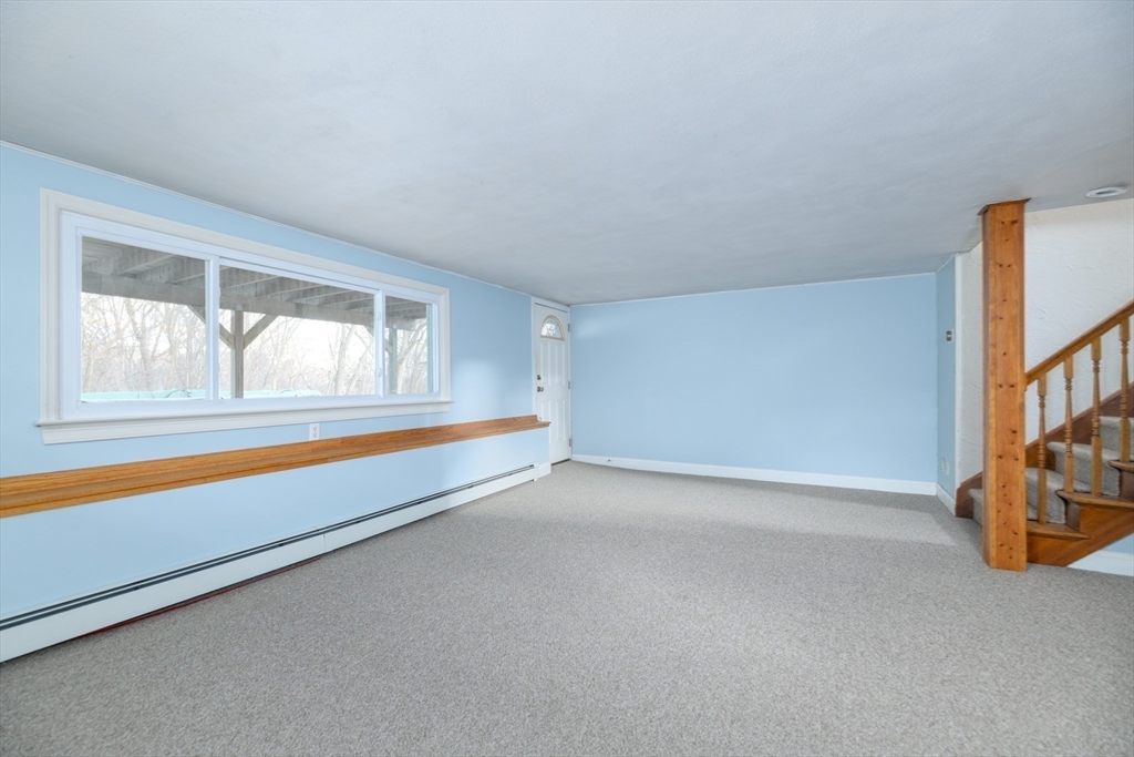 29 Manor Road Auburn, MA 01501 - Photo 11 of 21 a view of an empty room and window