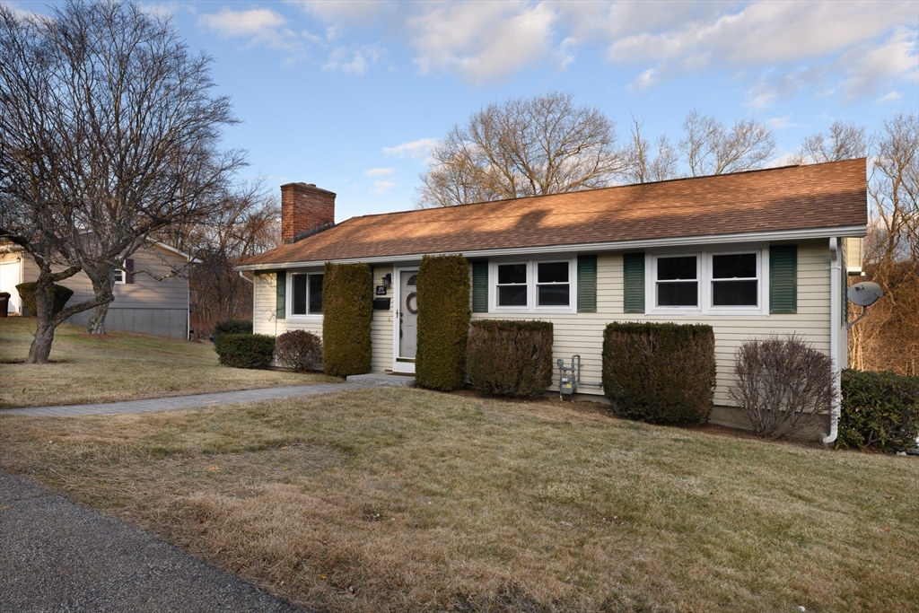 29 Manor Road Auburn, MA 01501 - Photo 2 of 21 a front view of a house with yard