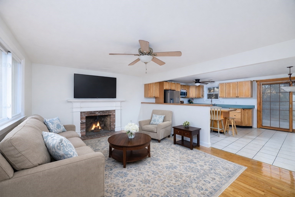 29 Manor Road Auburn, MA 01501 - Photo 3 of 21 a living room with furniture and a fireplace