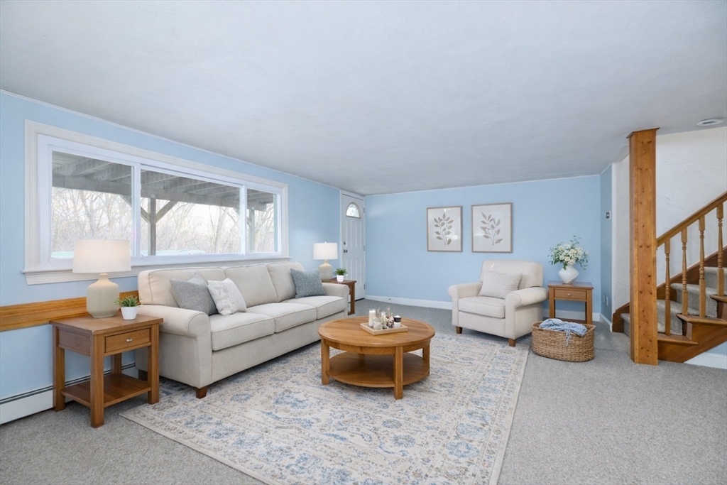 29 Manor Road Auburn, MA 01501 - Photo 10 of 21 a living room with furniture and a large window