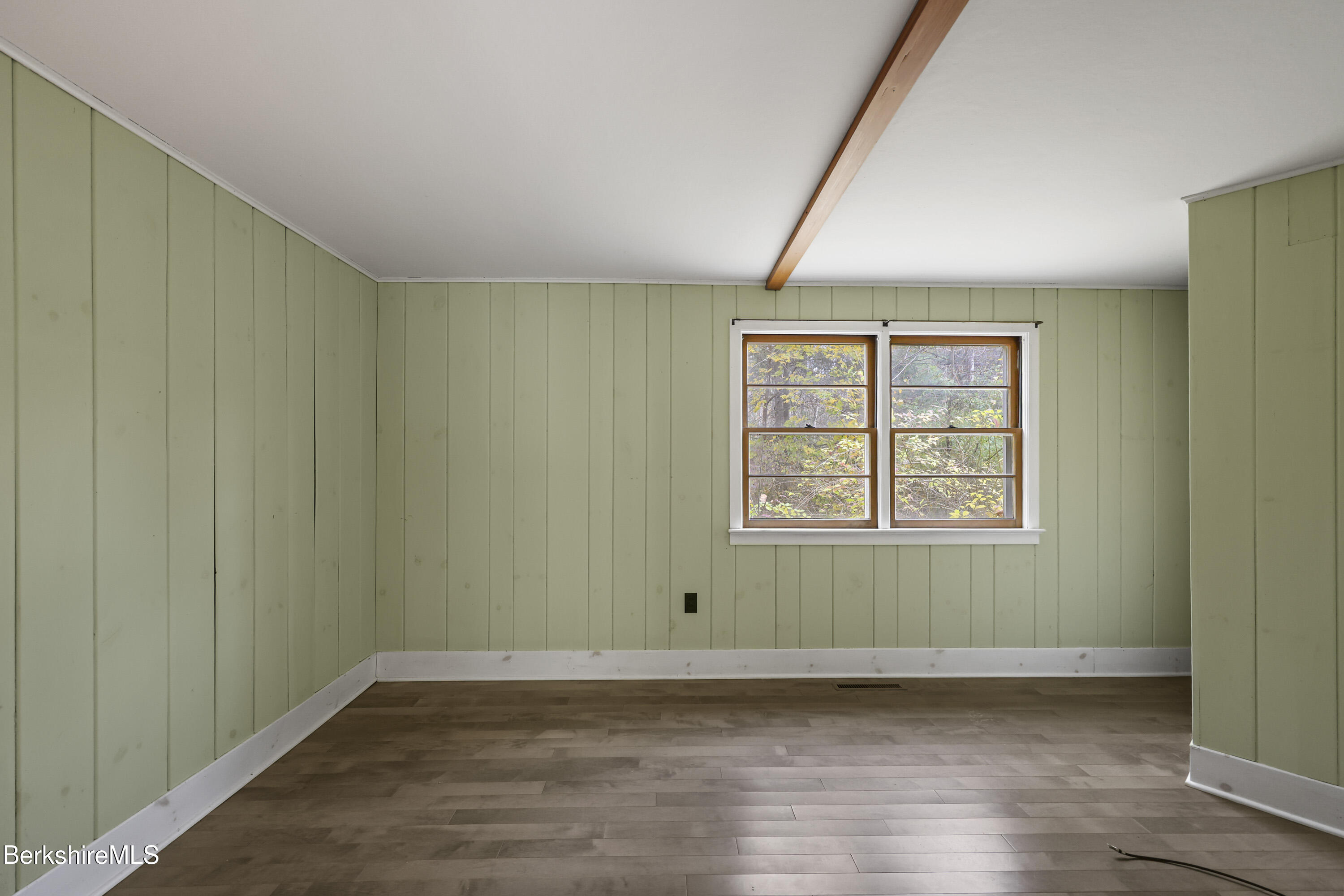 245 Long Pond Road Great Barrington, MA 01230 - Photo 20 of 34 an empty room with wooden floor and windows