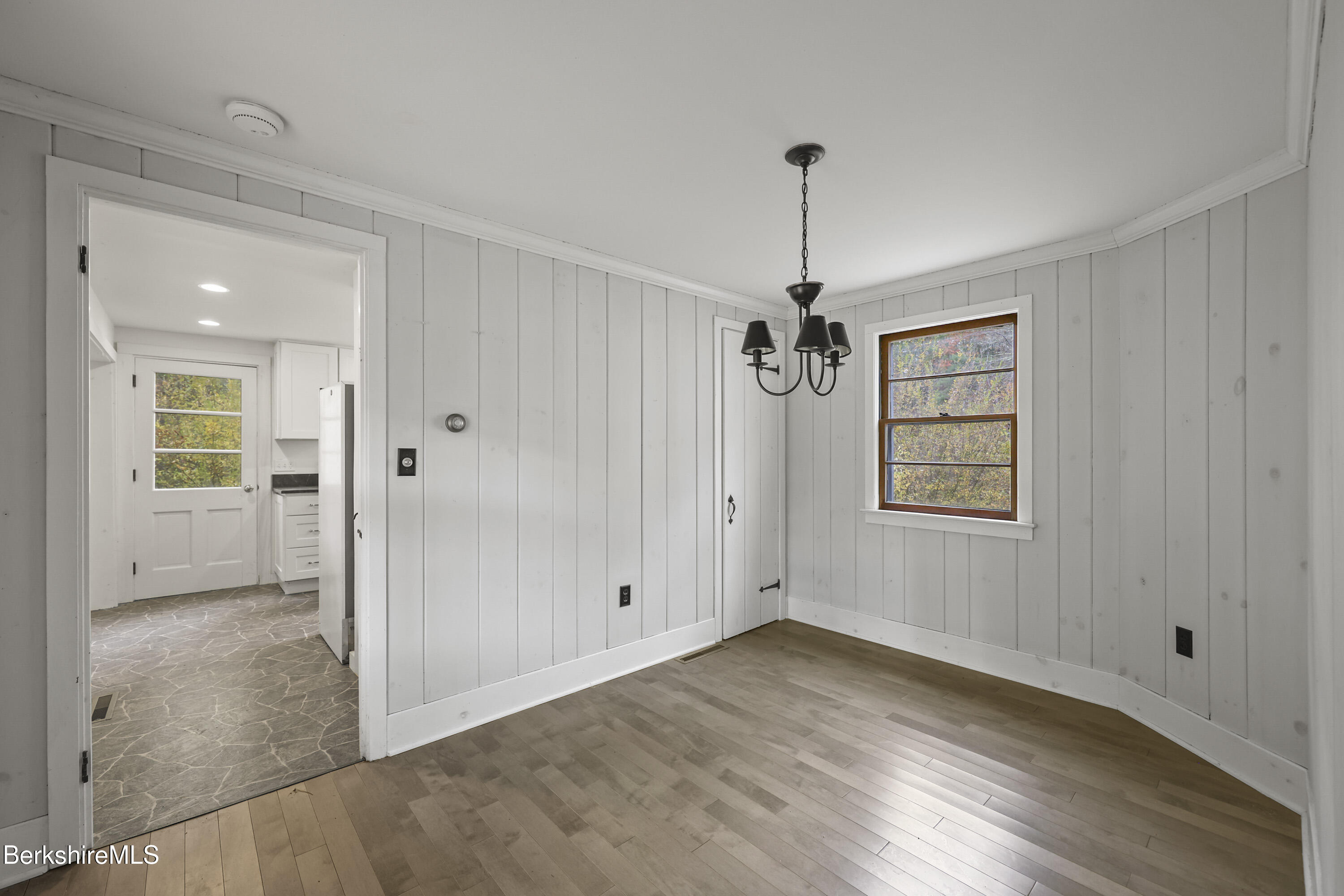 245 Long Pond Road Great Barrington, MA 01230 - Photo 9 of 34 wooden floor in an empty room with a window