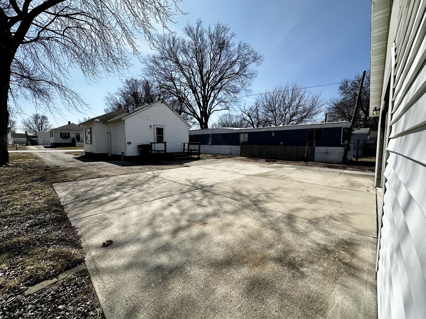 1619 East Washington Street Clinton, IL 61727 - Photo 26 of 32 a view of wooden house with a yard