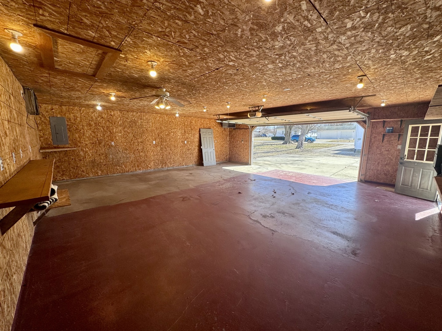 1619 East Washington Street Clinton, IL 61727 - Photo 28 of 32 an empty room with wooden floor and windows