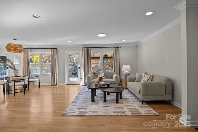 a living room with furniture and a table