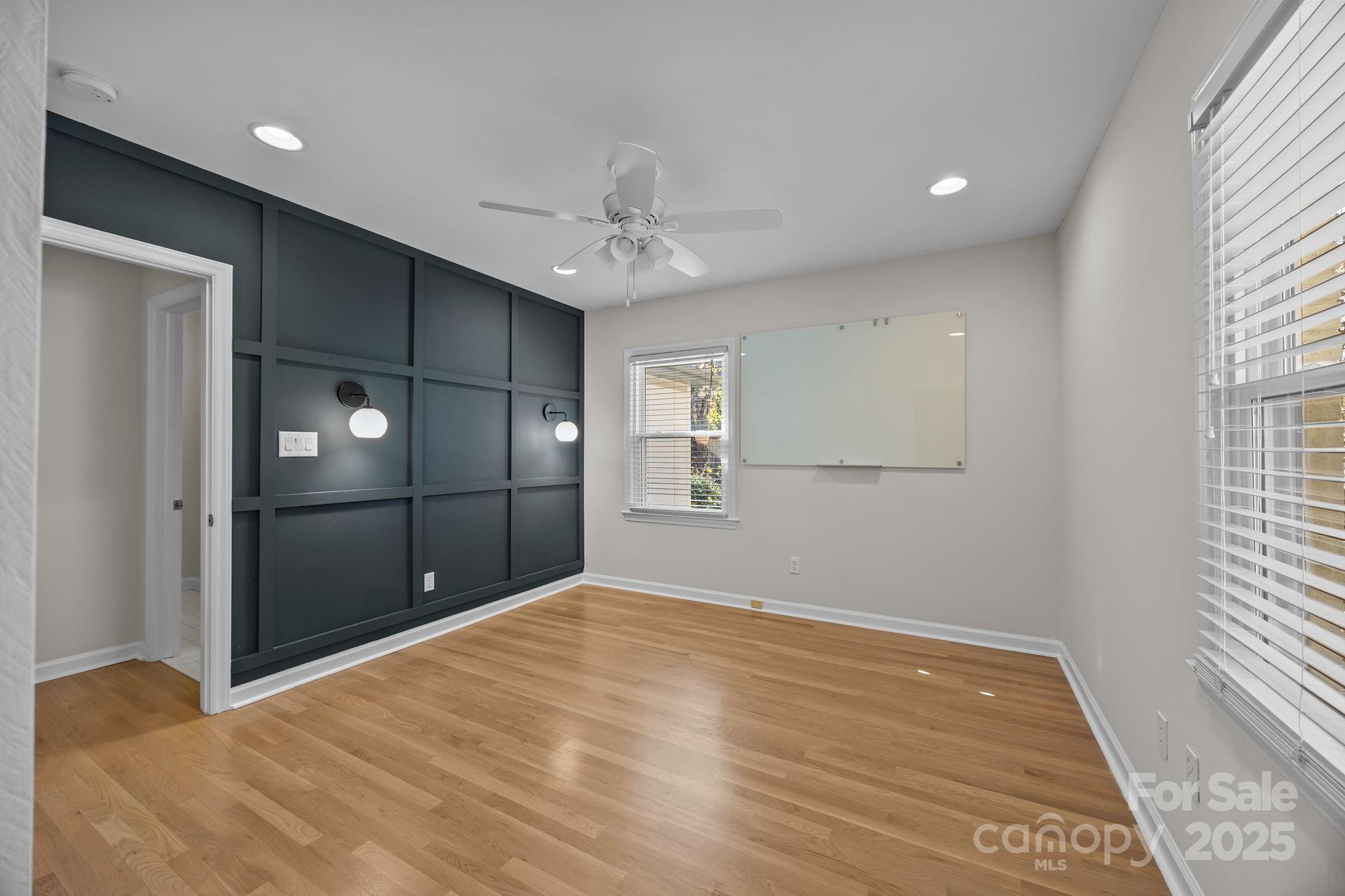 1022 Churchill Road Davidson, NC 28036 - Photo 23 of 39 a view of an empty room with cabinet and a window
