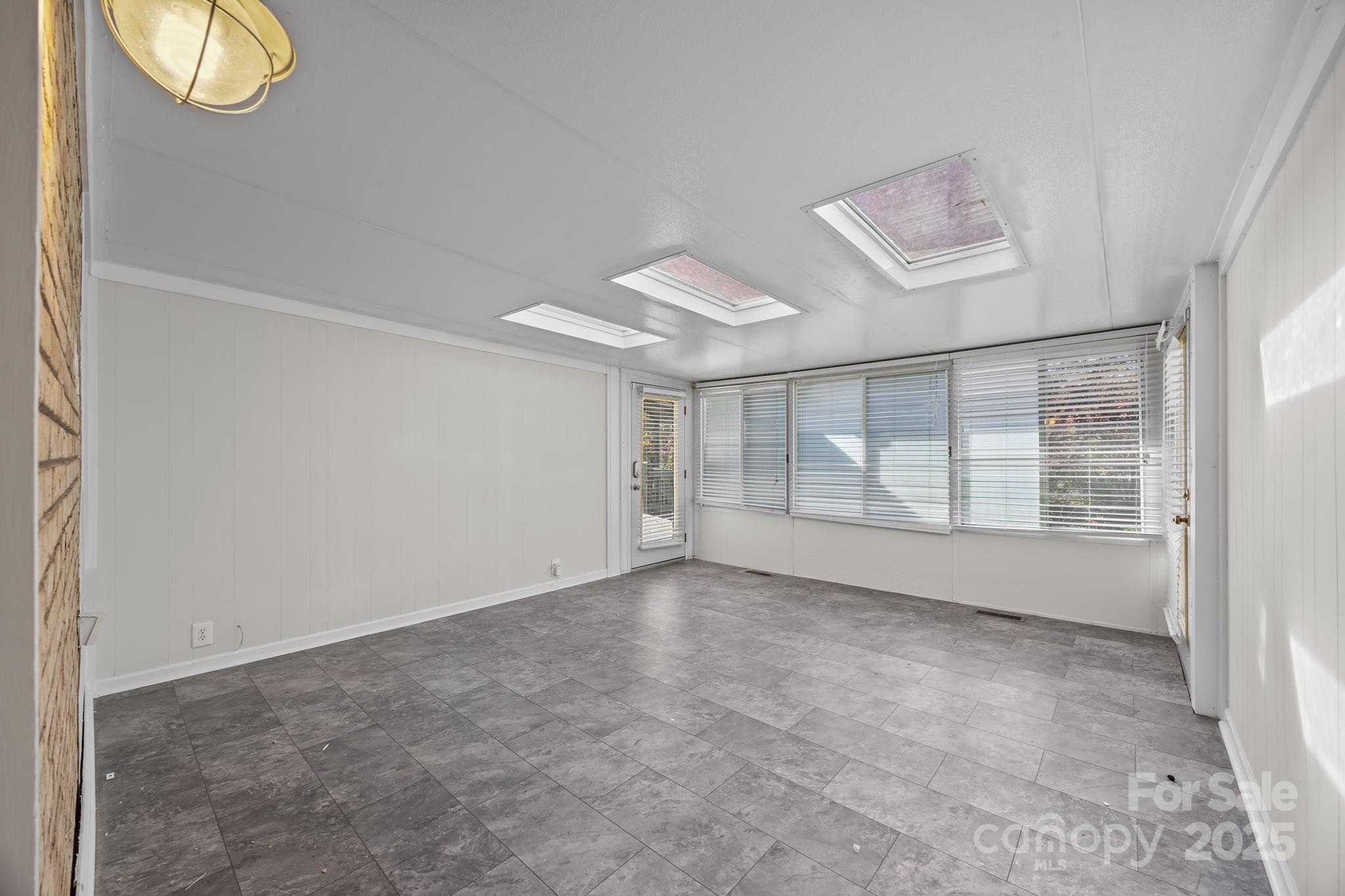 1022 Churchill Road Davidson, NC 28036 - Photo 27 of 39 an empty room with windows