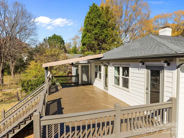 a view of a house with a roof deck