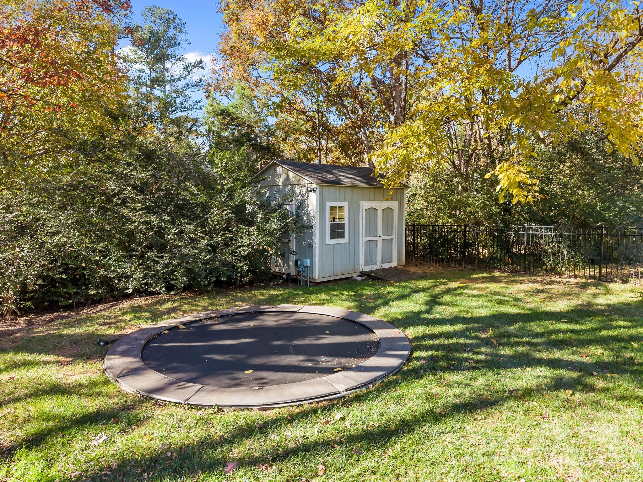 1022 Churchill Road Davidson, NC 28036 - Photo 33 of 39 a view of a house with a yard