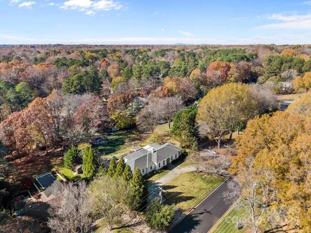 an aerial view of residential house with outdoor space