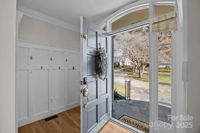 a view of a hallway with windows