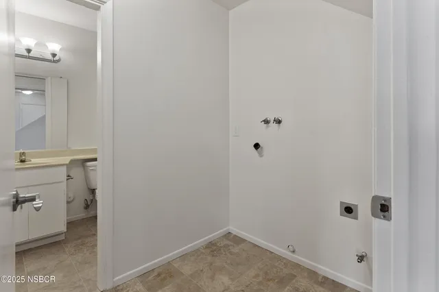 a bathroom with a sink and a toilet