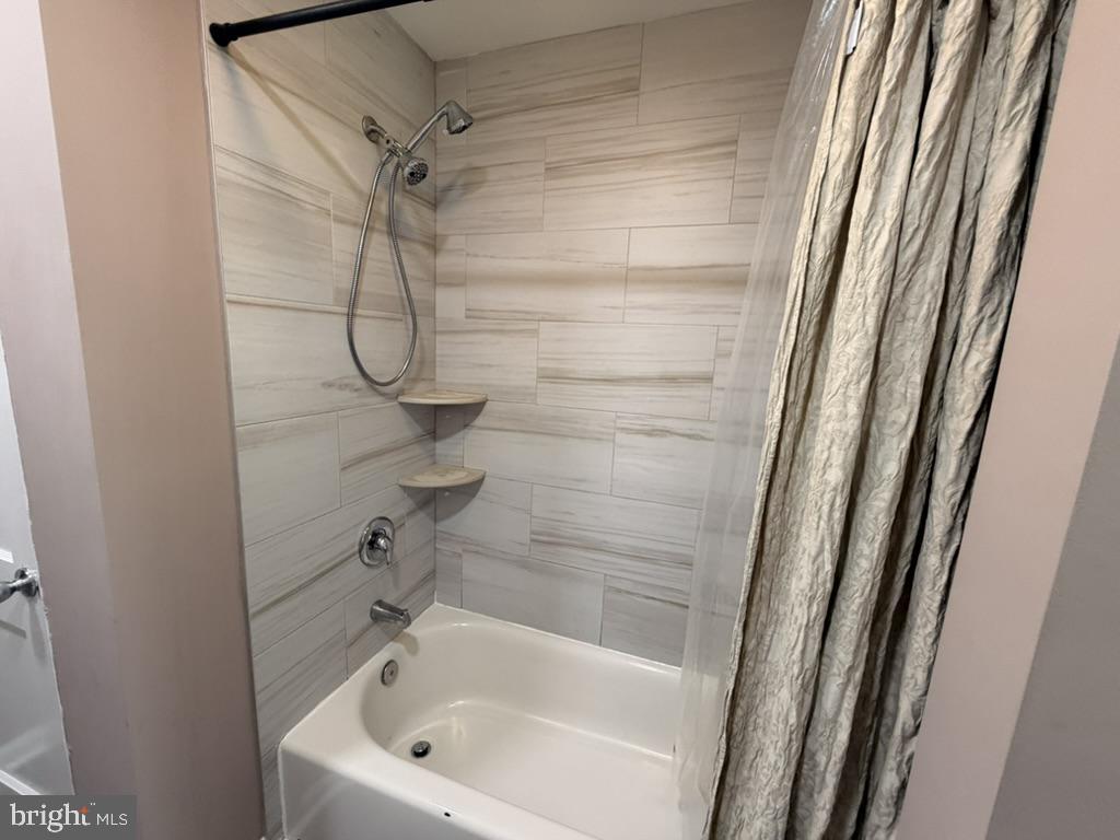 8 South Reed Street Bel Air, MD 21014 - Photo 18 of 23 Modern shower with elegant tiles.