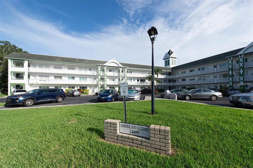 2469 Franciscan Drive, Unit 53 Clearwater, FL 33763 - Photo 26 of 51 a wooden bench sitting in the middle of a building