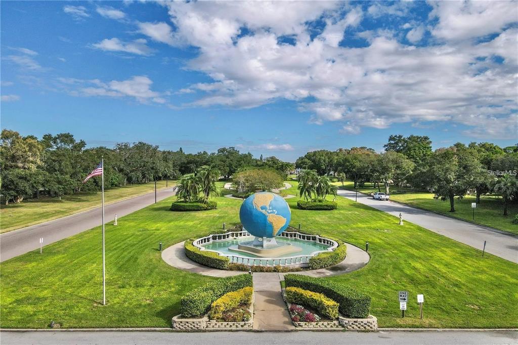 2469 Franciscan Drive, Unit 53 Clearwater, FL 33763 - Photo 48 of 51 a view of a garden with an outdoor seating
