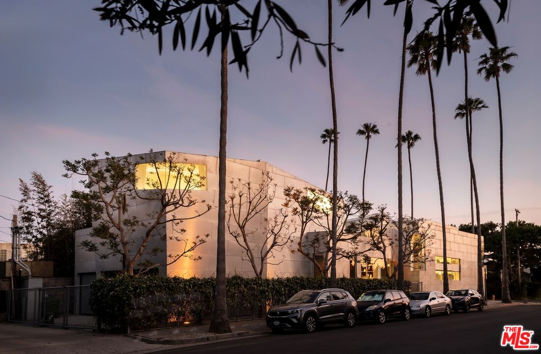a view of a street with cars