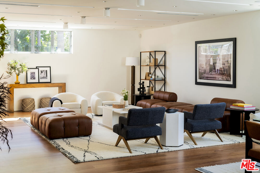702 6th Avenue Venice, CA 90291 - Photo 11 of 27 a living room with furniture and a window