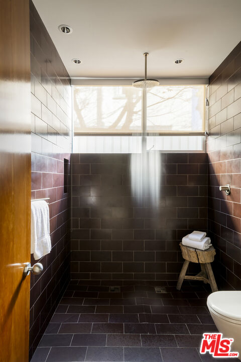 702 6th Avenue Venice, CA 90291 - Photo 20 of 27 a bathroom with a toilet and a shower