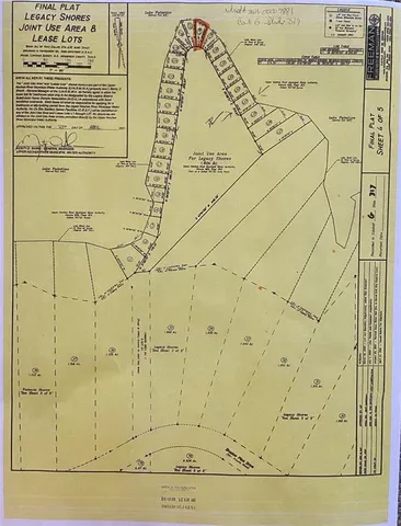 a view of a park with iron fence