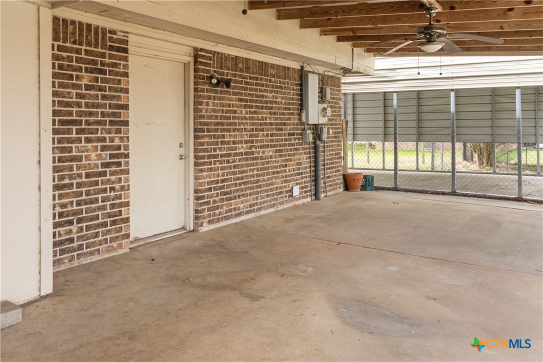 204 Berwick Road Victoria, TX 77904 - Photo 31 of 38 a view of an empty room with a sliding door
