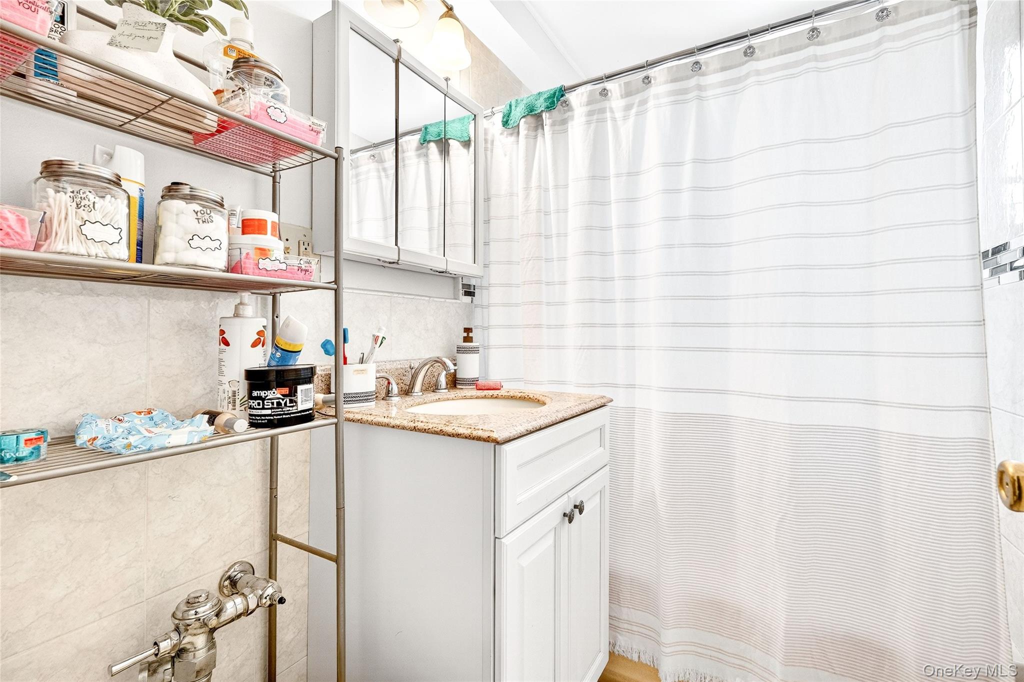 1314 Virginia Avenue, Unit 6G Bronx, NY 10462 - Photo 20 of 34 a kitchen with stainless steel appliances a sink a stove and a refrigerator