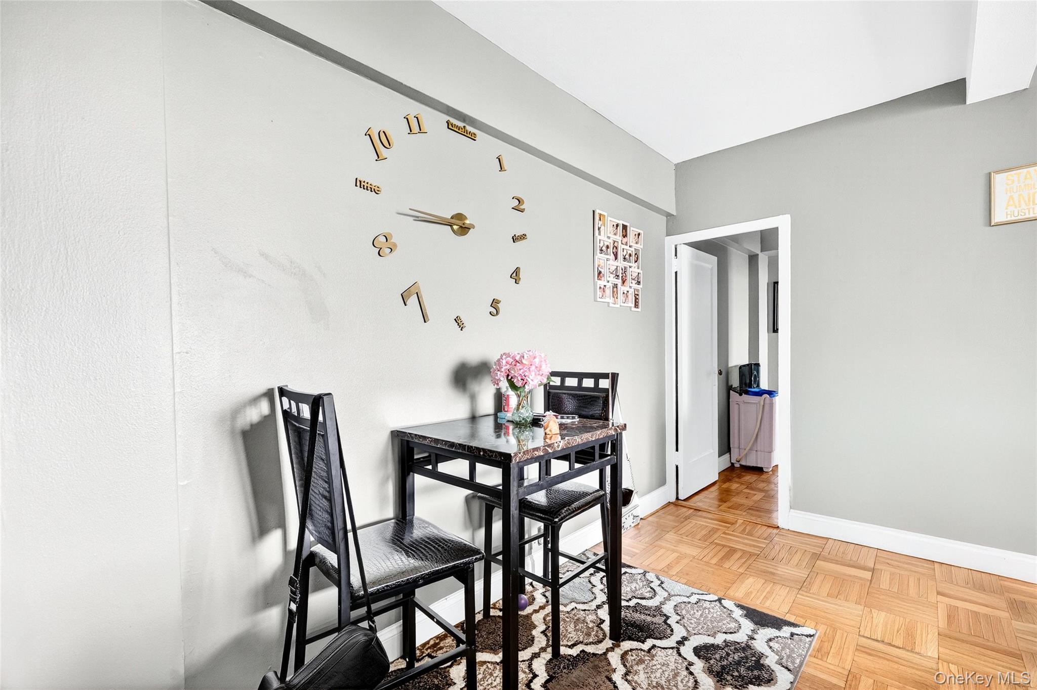 1314 Virginia Avenue, Unit 6G Bronx, NY 10462 - Photo 5 of 34 a view of a dining room with furniture and wooden floor