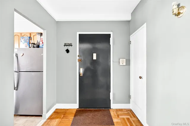 a view of bathroom with a sink and mirror