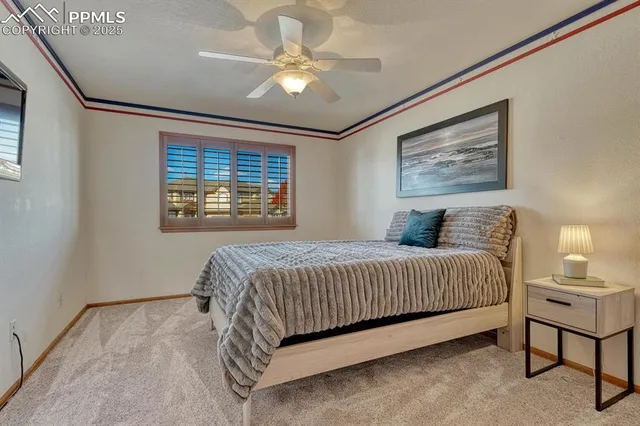 a kitchen with a stove a refrigerator and a dining table
