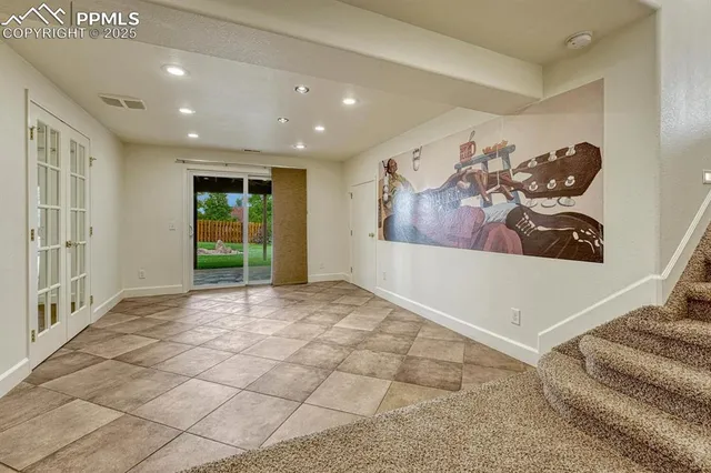 a view of a chairs and table on the wooden floor