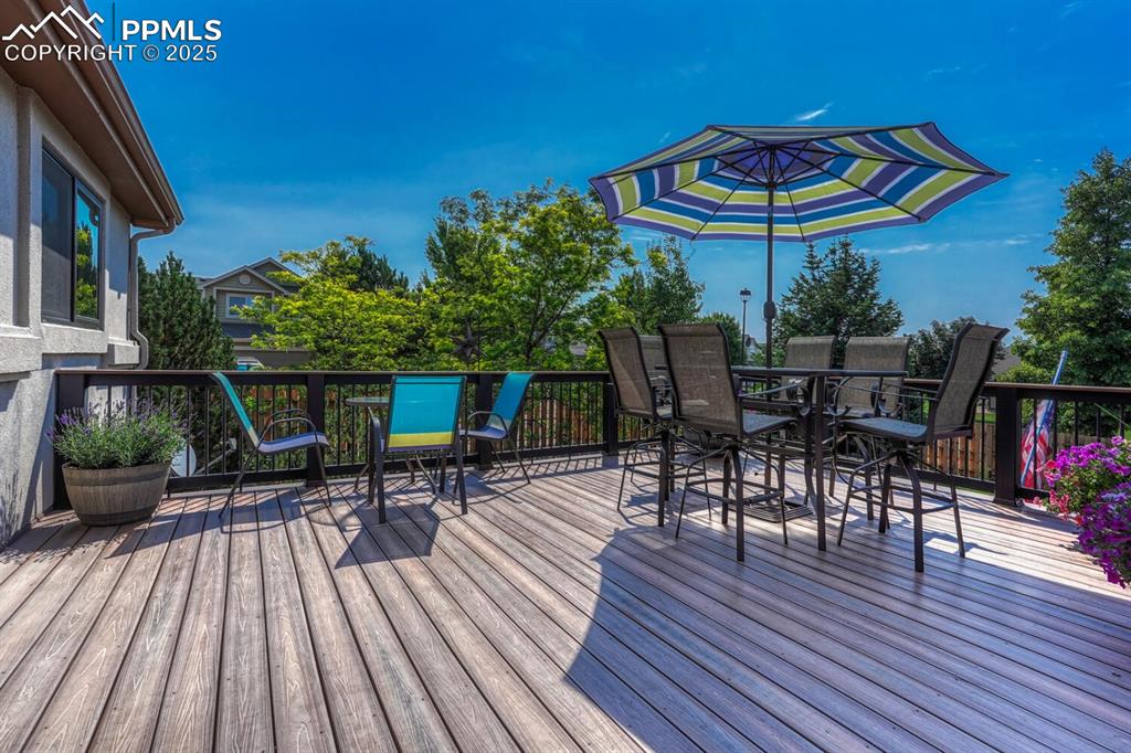 339 Sandreed Place Colorado Springs, CO 80921 - Photo 41 of 50 Wooden terrace featuring outdoor dining space