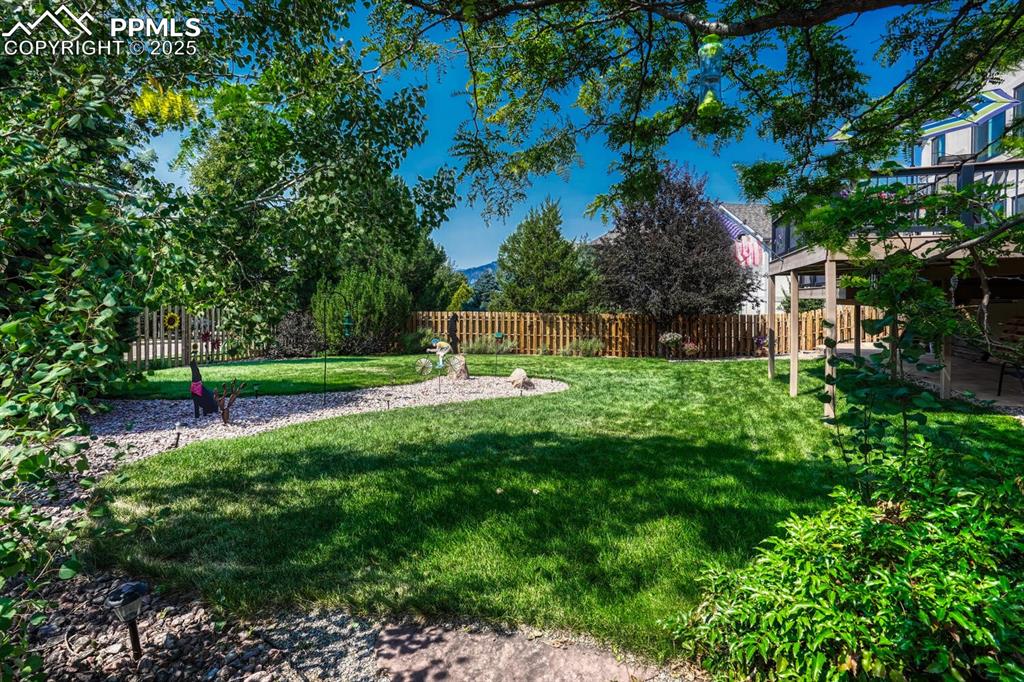 339 Sandreed Place Colorado Springs, CO 80921 - Photo 46 of 50 Fenced backyard with a patio