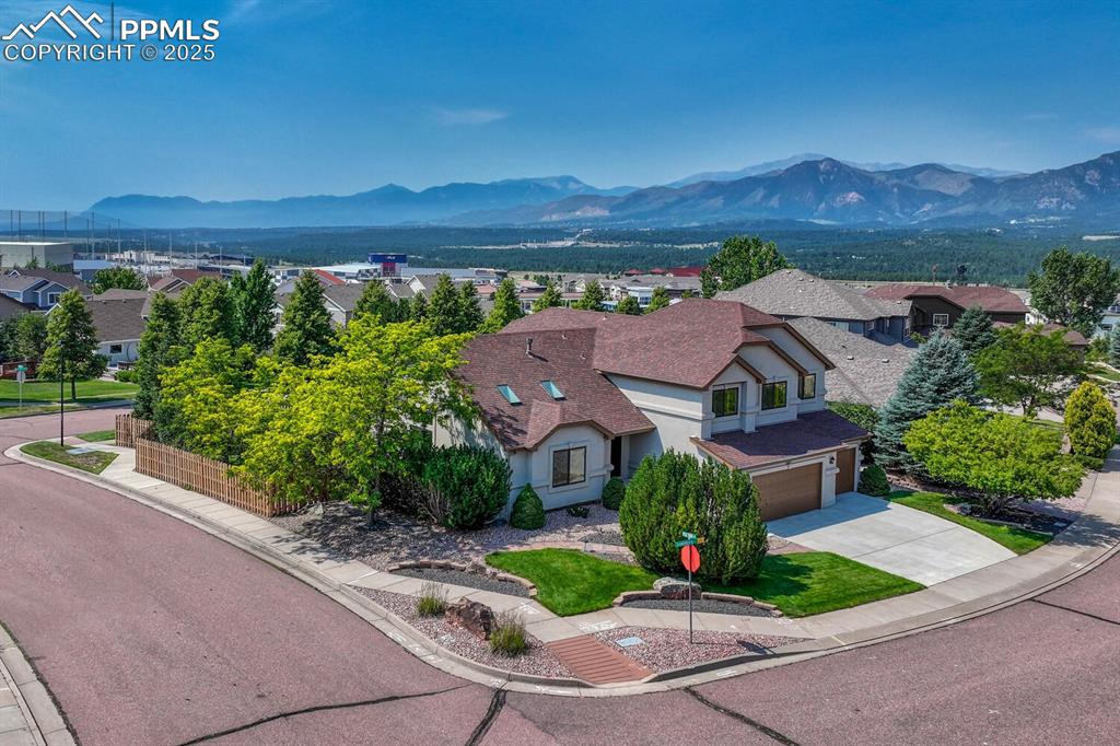 339 Sandreed Place Colorado Springs, CO 80921 - Photo 48 of 50 Aerial view of residential area featuring a mountain backdrop