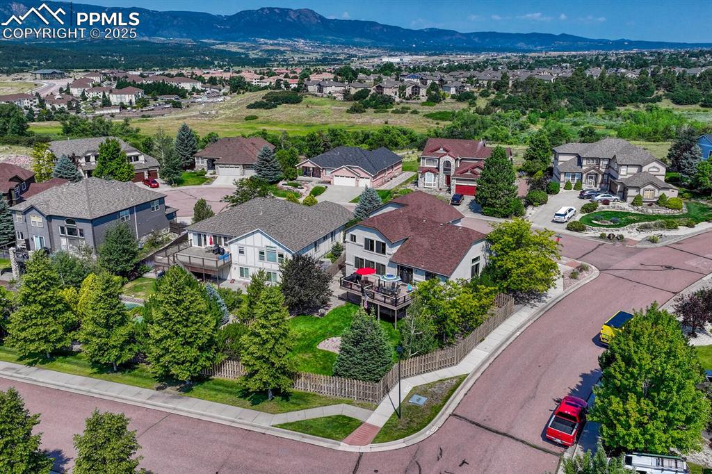 339 Sandreed Place Colorado Springs, CO 80921 - Photo 50 of 50 Aerial view of residential area with mountains