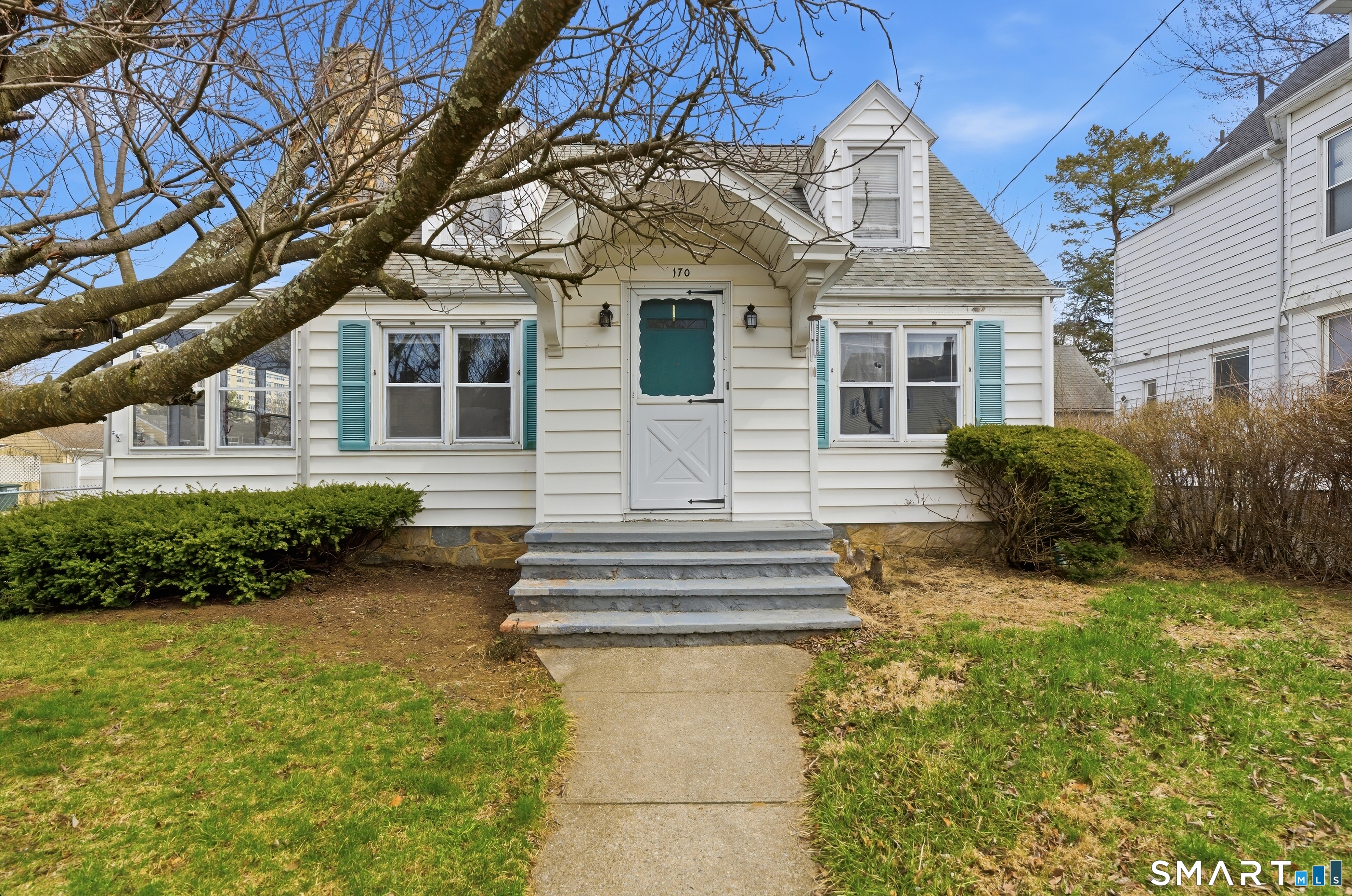 170 Hillside Avenue Bridgeport, CT 06604 - Photo 1 of 35 a front view of a house with garden