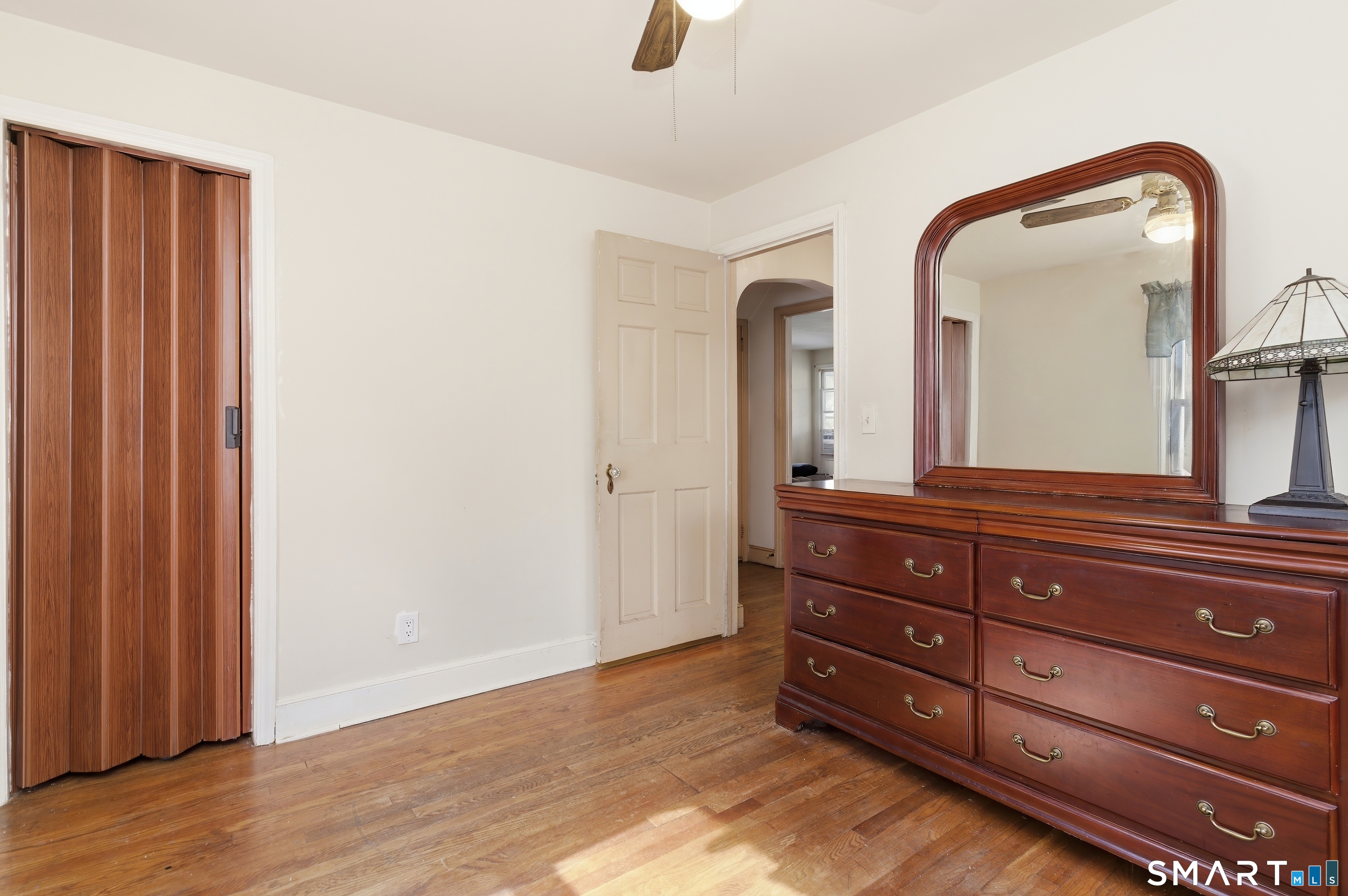 170 Hillside Avenue Bridgeport, CT 06604 - Photo 17 of 35 a room with a dresser and a mirror
