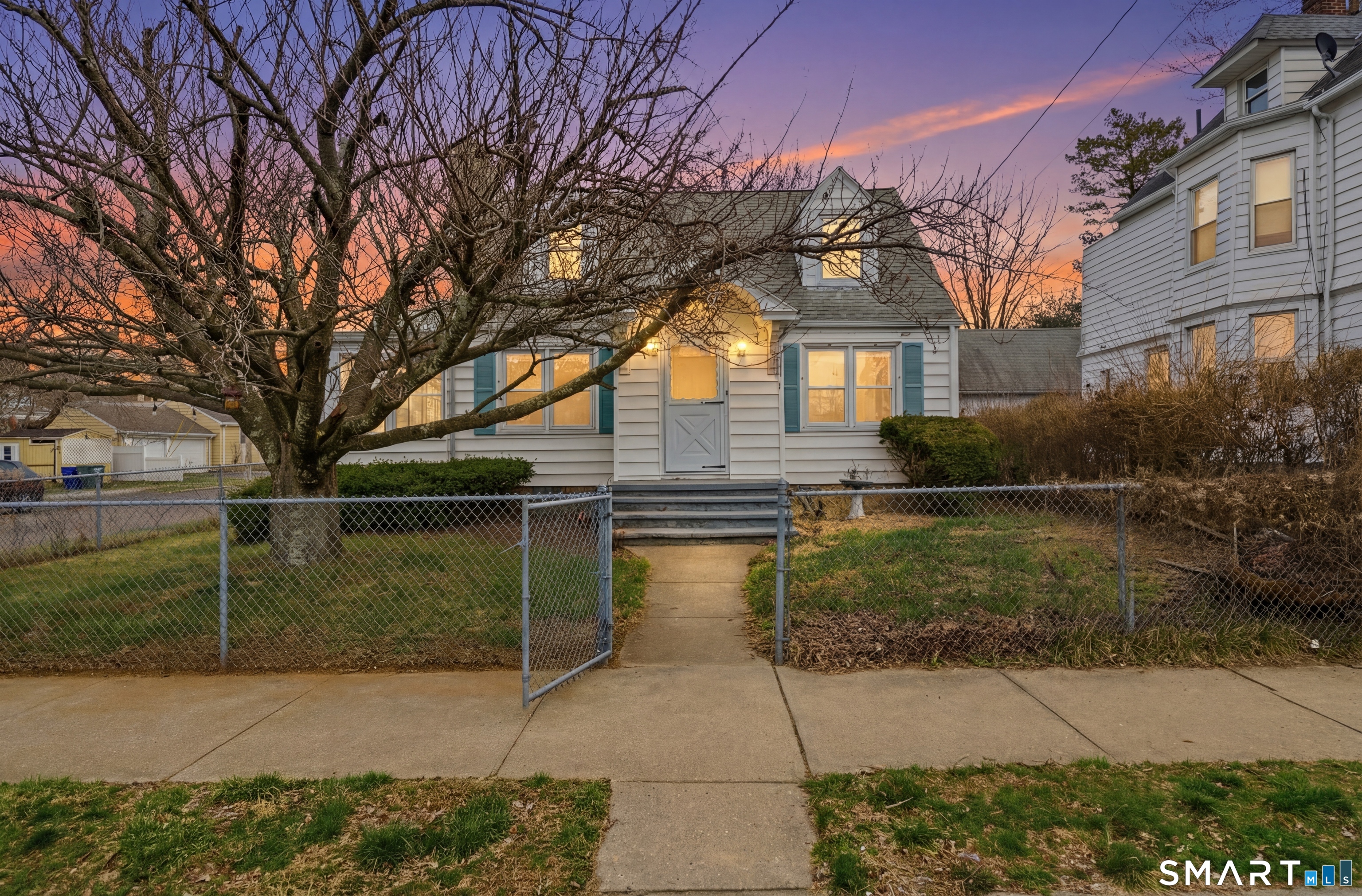 170 Hillside Avenue Bridgeport, CT 06604 - Photo 2 of 35 a front view of a house with garden