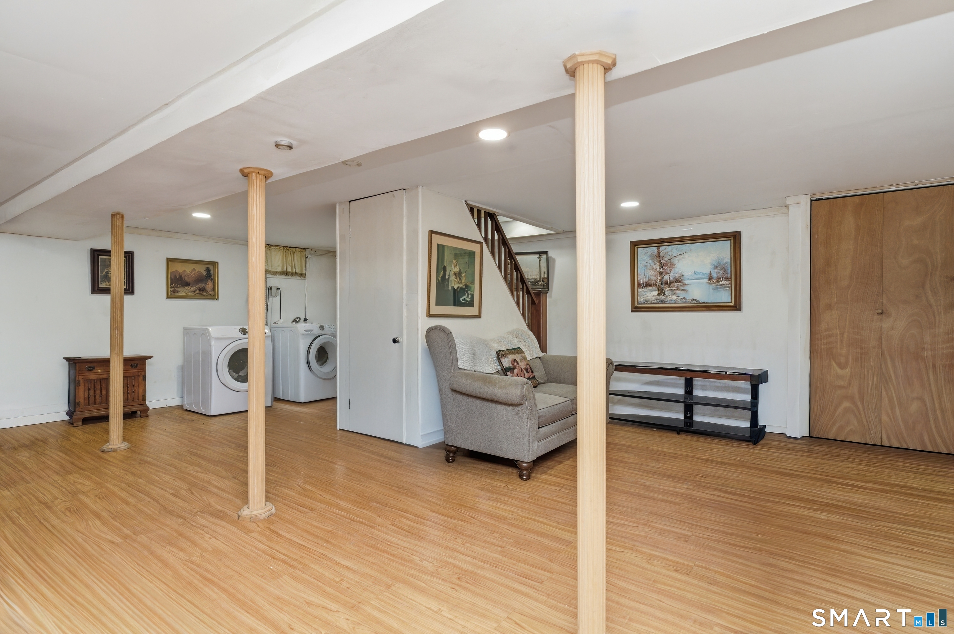 170 Hillside Avenue Bridgeport, CT 06604 - Photo 28 of 35 a bedroom with furniture and wooden floor