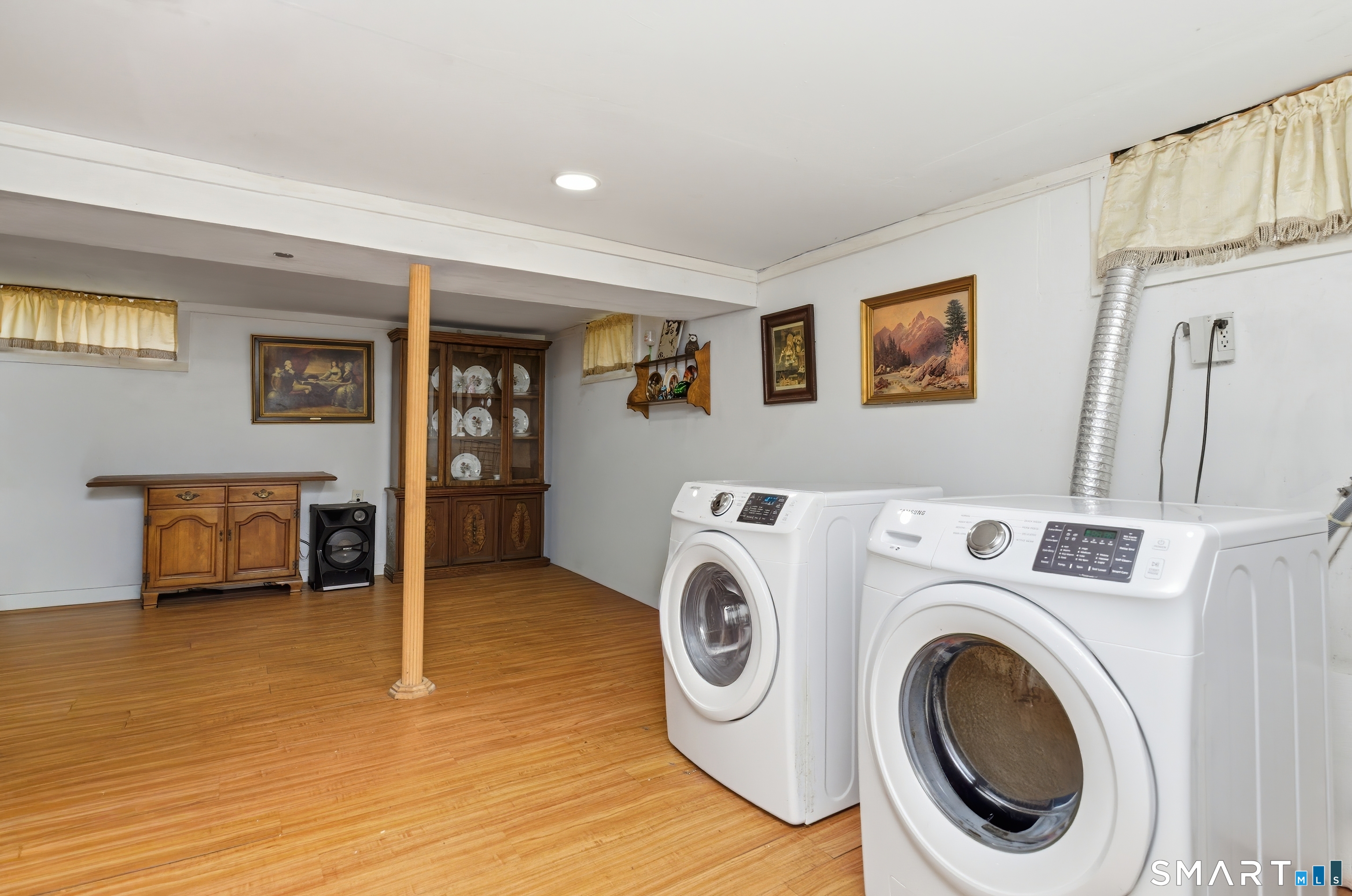 170 Hillside Avenue Bridgeport, CT 06604 - Photo 29 of 35 a view of livingroom with washer and dryer