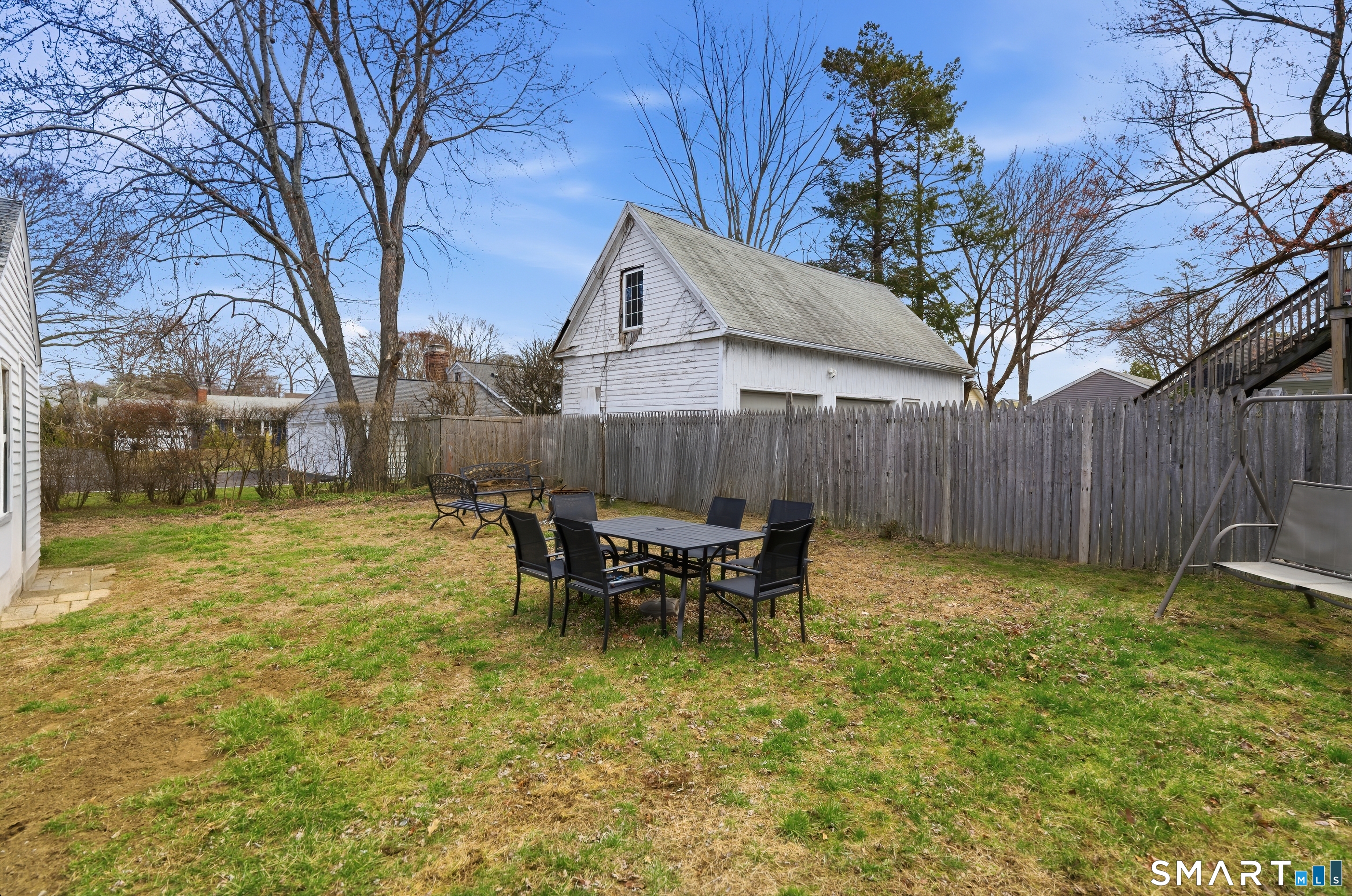 170 Hillside Avenue Bridgeport, CT 06604 - Photo 31 of 35 a backyard of a house with table and chairs