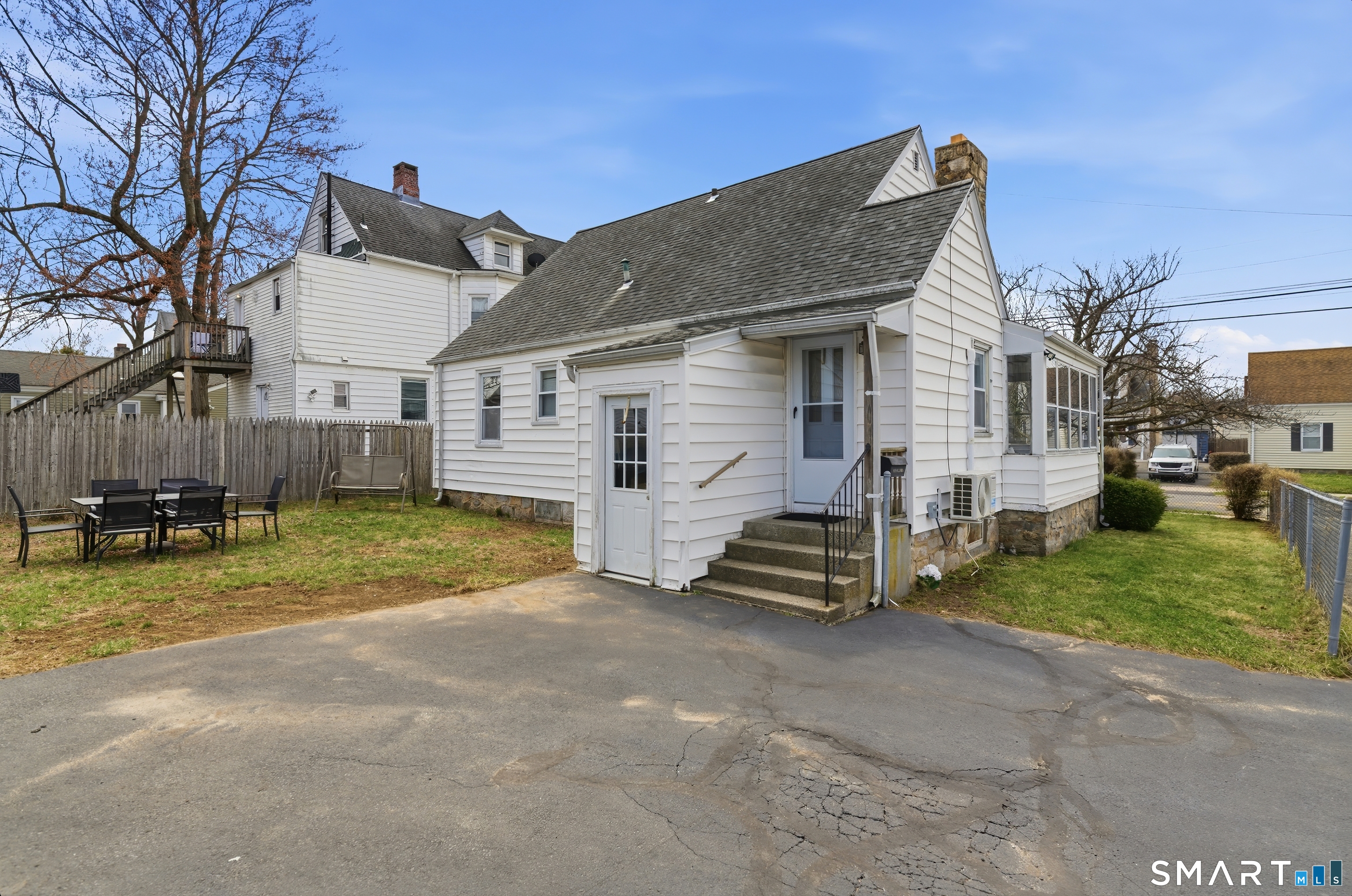 170 Hillside Avenue Bridgeport, CT 06604 - Photo 34 of 35 a view of a house with a yard and sitting area