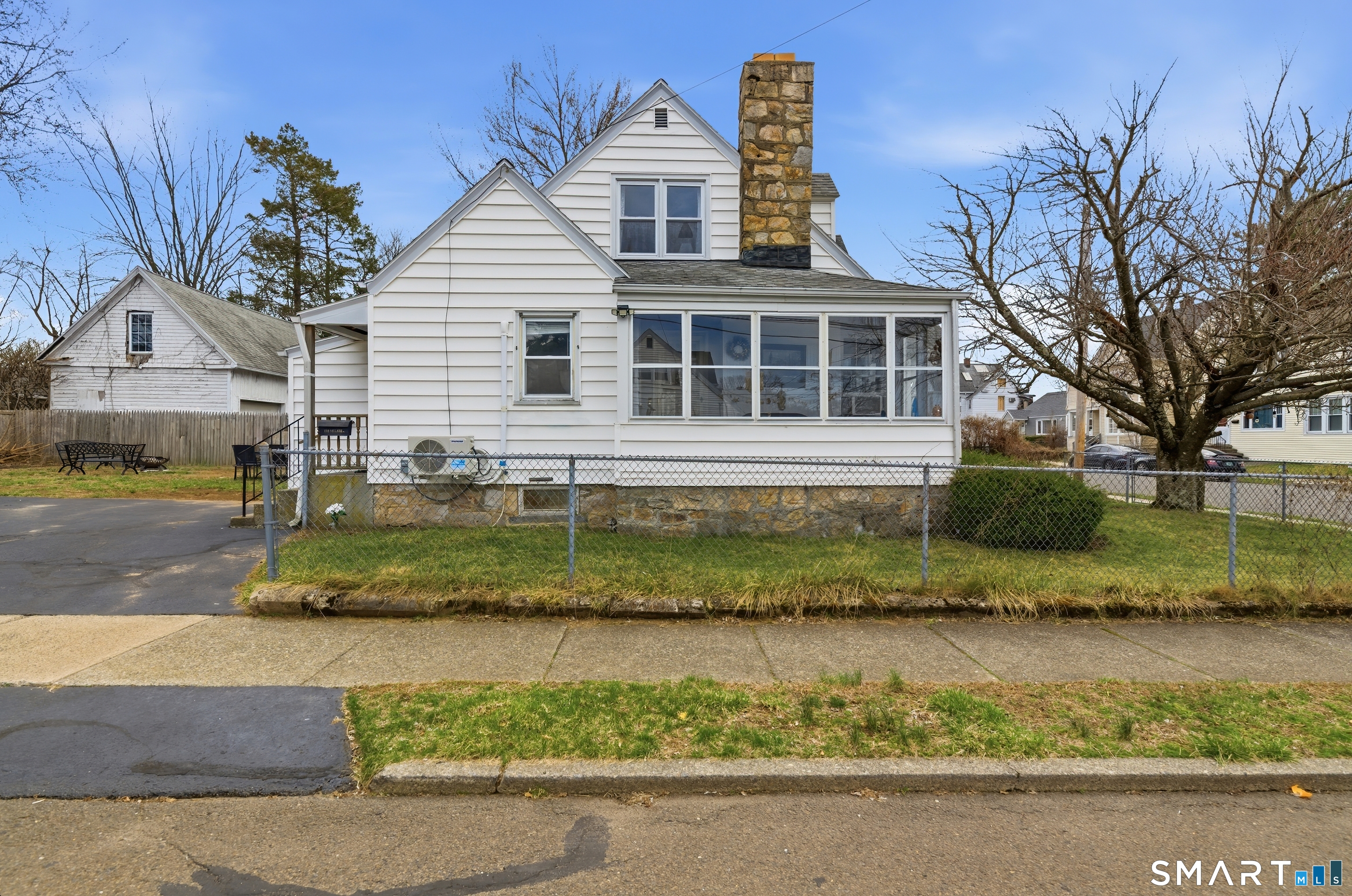 170 Hillside Avenue Bridgeport, CT 06604 - Photo 35 of 35 a front view of a house with a yard and garage